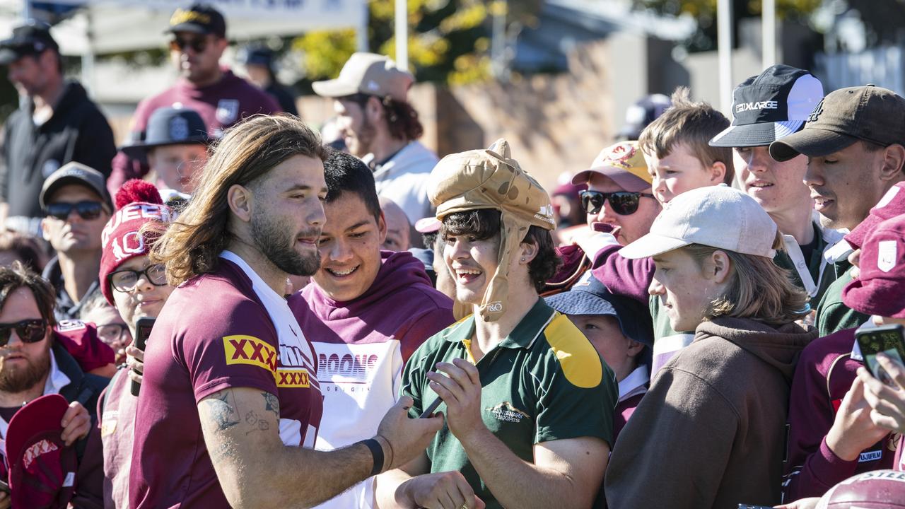 Patrick Carrigan with fans (from left) Charles Renbo, Hayden Pobar and Nate de Nooyer at Queensland Maroons fan day at Toowoomba Sports Ground, Tuesday, June 18, 2024. Picture: Kevin Farmer