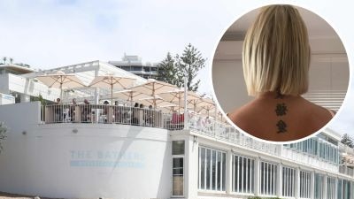 A Burleigh mother was left feeling "insulted" after her tattoos meaning "love, family and happiness" were deemed inappropriate for a Gold Coast venue.