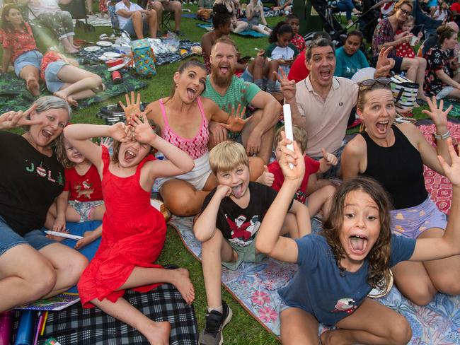 Wilson & Redway & Duncan got in the Christmas spirit during the annual Carols by Candlelight at the Botanical Gardens on Sunday night which attracted thousands to the Amphitheatre for a warm night of carols. Picture: Pema Tamang Pakhrin.