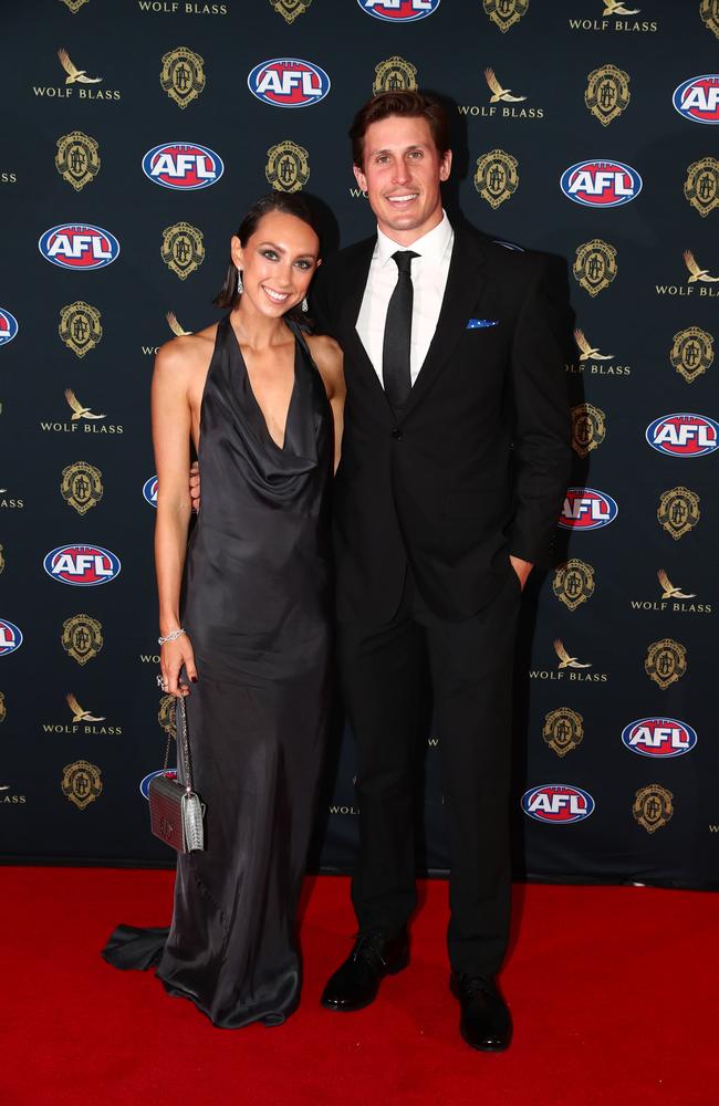 David Swallow of the Suns and Georgia Homer in Brisbane. Picture: Getty Images