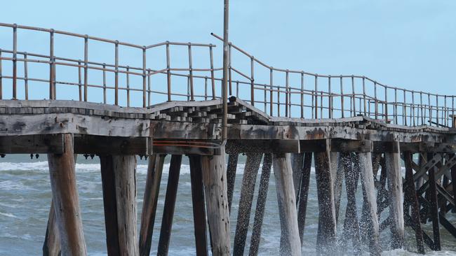 The wooden planks were lifted up by huge waves. Picture: Dean Martin