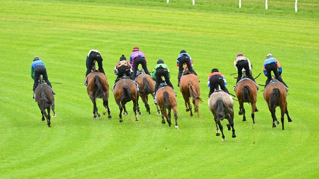 Victorian jockeys are paid for official trials but not jumpouts as they are traditionally deemed as part of horse training and an opportunity for riders to help trainers in return for race rides. Picture: Vince Caligiuri/Getty Images.