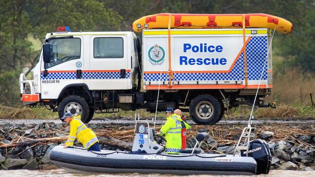 A white Hyuandai Van which is lifted from the Tweed River at Tumbulgum after a three person fatal car accident on Monday April 3, 2017. Picture: SCOTT POWICK