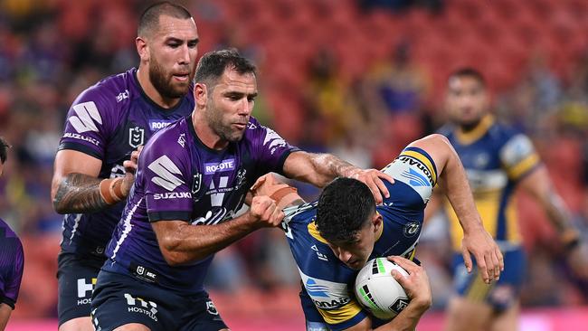 Cameron Smith tackling Dylan Brown in the qualifying final. Picture: Getty