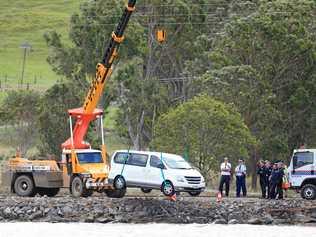 A white Hyuandai Van is lifted from the Tweed River at Tumbulgum after a 3 person fatal car accident on Monday the 3rd April 2017.POLICE have worked tirelessly to retrieve the bodies of a mother and her two children from their vehicle after it crashed into the Tweed River yesterday. Picture: SCOTT POWICK