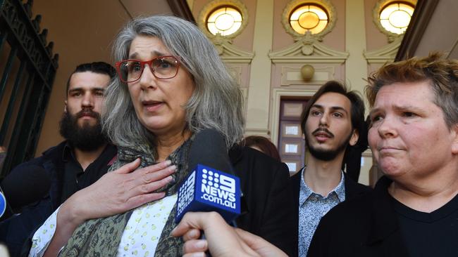 Megan Quinn, mother of Hannah Quinn, with her sons Elliot Quinn (second right) and Dominic Quinn (left), are seen leaving the Newtown Local Court. Picture: AAP