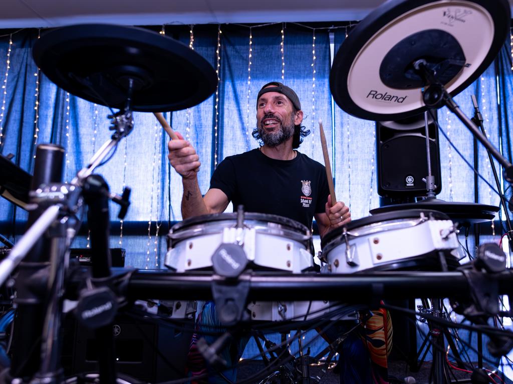 Costa demonstrating how to execute a drum solo.