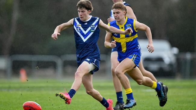 A Mornington Peninsula player kicks during the South East Region Junior Development Carnival U17 Boys match between Mornington Peninsula and Frankston District at Olympic Park in Rosebud. (Photo by Josh Chadwick)