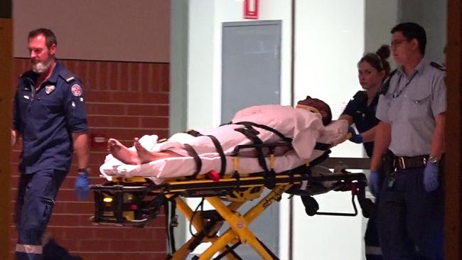 A man is taken to hospital from St George Dance Centre Kogarah. Picture: TNV