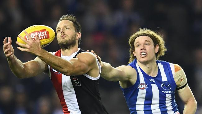 Nathan Brown of the Saints marks infront of Ben Brown of the Kangaroos.