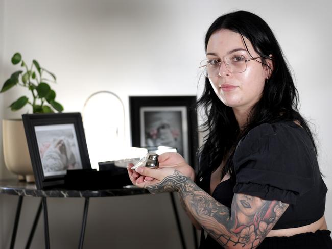 Haylee Loccisano, holding an Urn of her unborn baby Celeste who was killed in a car crash at Ipswich and a 17-year-old girl charged, Springfield Lakes - on Friday 1st of November 2024 - Photo Steve Pohlner