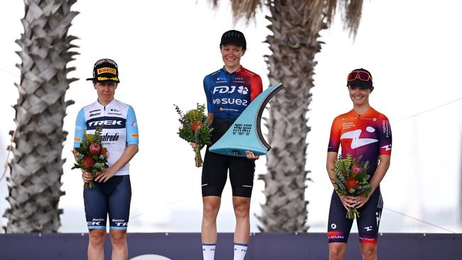 GEELONG, AUSTRALIA - JANUARY 28: (L-R) Amanda Spratt of Australia and Team Trek - Segafredo on second place, race winner Loes Adegeest of The Netherlands and Team FDJ-SUEZ and Nina Buijsman of The Netherlands and Team Human Powered Health on third place pose on the podium ceremony after the 7th Cadel Evans Great Ocean Road Race 2023 - Women's Elite a 140,8km one day race from Geelong to Geelong / #CadelRoadRace / #UCIWWT / on January 28, 2023 in Geelong, Australia. (Photo by Tim de Waele/Getty Images)