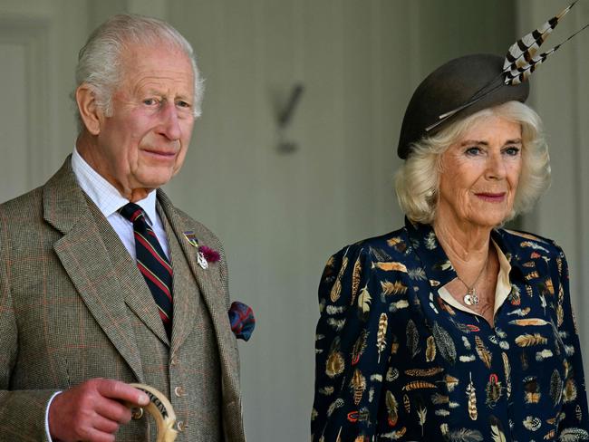 Britain's King Charles III and Britain's Queen Camilla attend the annual Braemar Gathering in Braemar, central Scotland, on September 7, 2024. The Braemar Gathering is a traditional Scottish Highland Games which predates the 1745 Uprising, and since 1848 it has been regularly attended by the reigning Monarch and members of the Royal Family. (Photo by ANDY BUCHANAN / AFP)