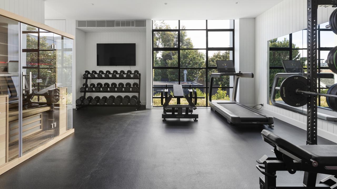 The property includes a soundproof gym which was used by Sam to film videos for his clients.