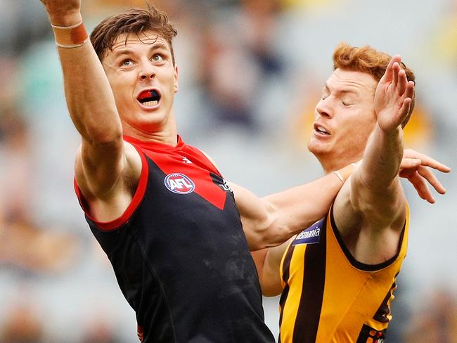 MELBOURNE, AUSTRALIA - APRIL 15:  Jake Lever of the Demons marks the ball during the round four AFL match between the Hawthorn Hawks and the Melbourne Demons at Melbourne Cricket Ground on April 15, 2018 in Melbourne, Australia.  (Photo by Daniel Pockett/AFL Media/Getty Images)