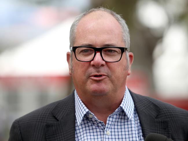 Minister for tourism Leon Bignal speaks about the attendance figures for the Adelaide 500 at press conference in Adelaide, Sunday, March 4, 2018.  (AAP Image/Kelly Barnes) NO ARCHIVING