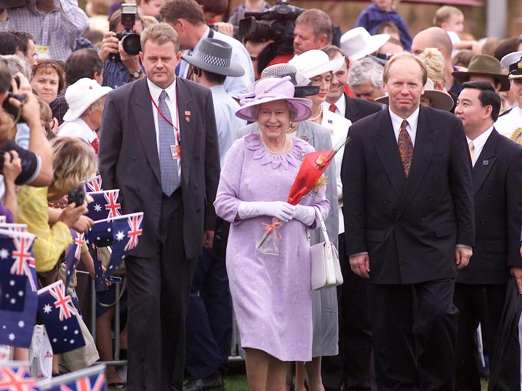 Queen Elizabeth II, with premier Peter Beattie during her 'meet the people walk' at Roma Street Parkland in 2002.