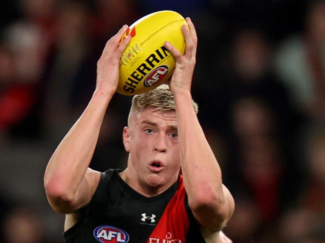 MELBOURNE, AUSTRALIA - AUGUST 10: Nate Caddy of the Bombers in action during the round 22 AFL match between Essendon Bombers and Gold Coast Suns at Marvel Stadium, on August 10, 2024, in Melbourne, Australia. (Photo by Jonathan DiMaggio/Getty Images)