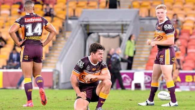 Brodie Croft and the Broncos react after their loss to the Titans. Picture: Bradley Kanaris/Getty Images