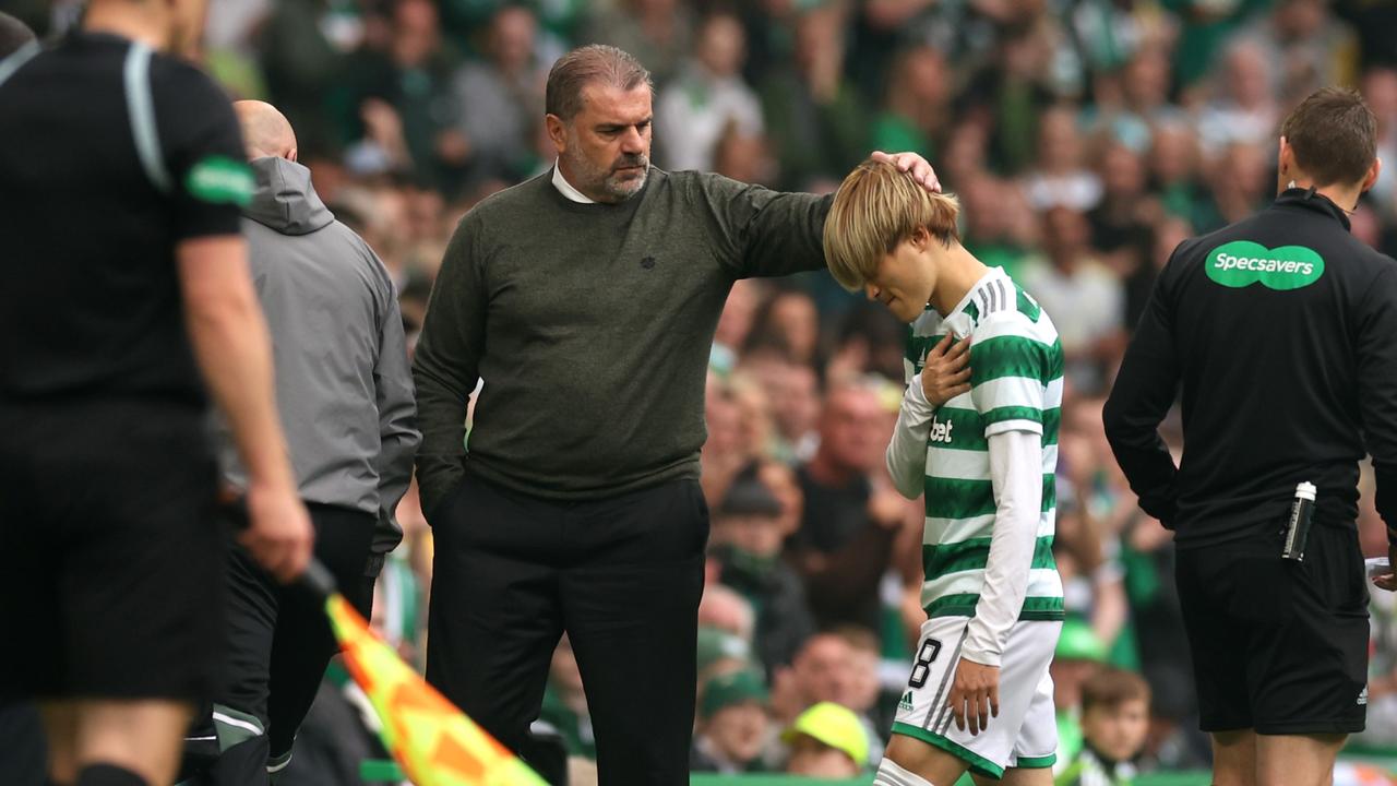 GLASGOW, SCOTLAND - SEPTEMBER 03: Kyogo Furuhashi is substituted and consoled by Angelos Postecoglou, Manager of Celtic during the Cinch Scottish Premiership match between Celtic FC and Rangers FC at on September 03, 2022 in Glasgow, Scotland. (Photo by Ian MacNicol/Getty Images)