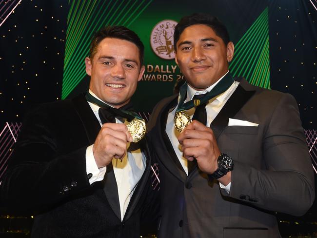 Cooper Cronk and Jason Taumalolo with their medals at the Dally M Awards on Wednesday.