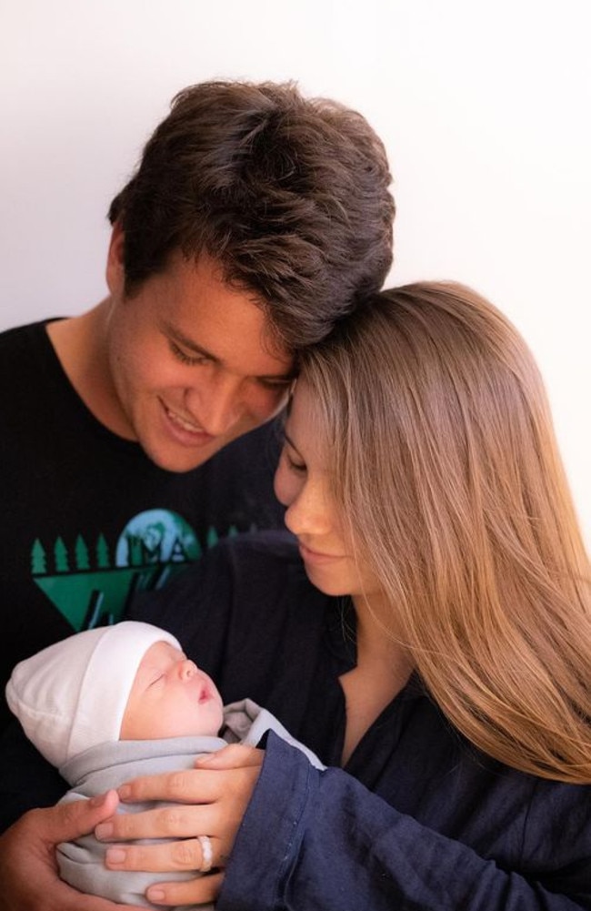 Bindi Irwin and husband Chandler Powell with their newborn daughter Grace Warrior Irwin Powell, who was born in 2021.