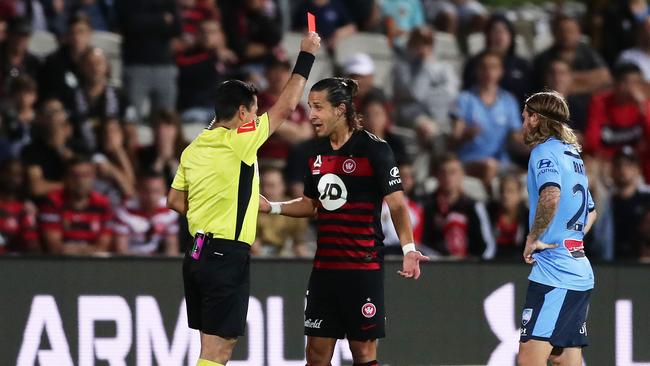 Wanderers’ Daniel Georgievski is shown a red card after clashing with Sydney FC’s Marco Tilio at Jubilee Stadium. Picture: Getty Images