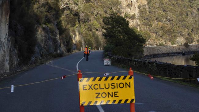 Removal of rock on the Tasman Highway near Orford. Picture ABC News Luke Bowden