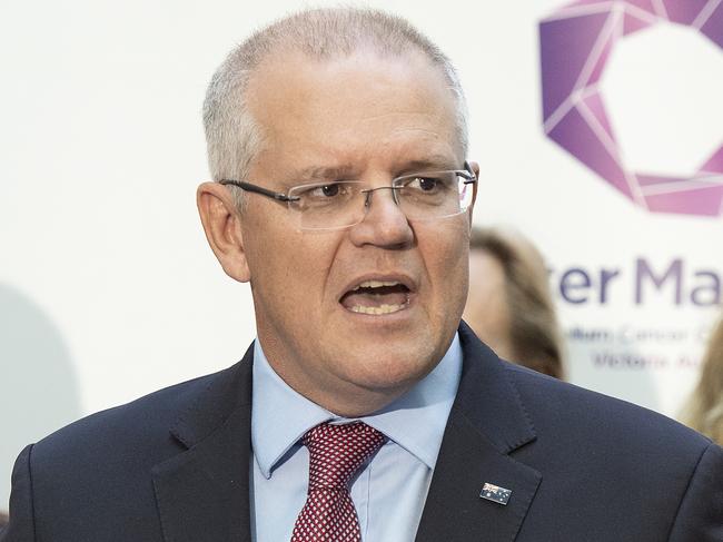 Prime Minister Scott Morrison speaks to the media during a tour of Peter MacCallum Cancer Centre in Melbourne, Monday, March 25th, 2019. (AAP Image/Ellen Smith) NO ARCHIVING