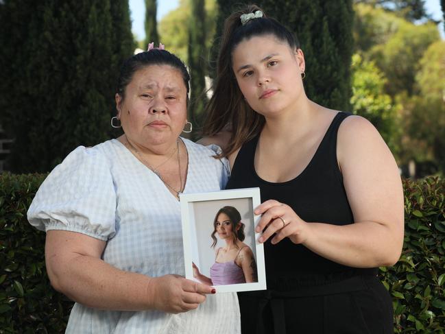 ADELAIDE, SOUTH AUSTRALIA - Advertiser Photos DECEMBER 16, 2024: Rachael Maxwell holding a picture of her daughter 25-year-old Odetta Maxwell who was killed in a car  crash in 2023 with her daughter Isobel Vlahiotis. Picture: Emma Brasier