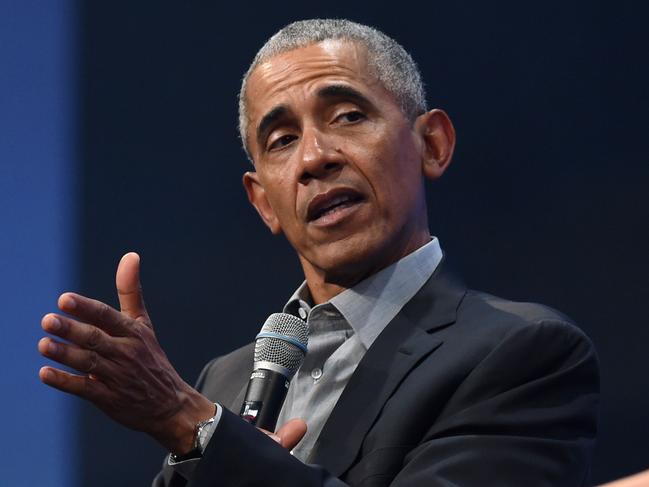 (FILES) In this file photo taken on September 29, 2019, former US President Barack Obama speaks during the "Bits & Pretzels" start-ups and founder congress in Munich, Germany. - Obama has launched a scathing attack on Donald Trump's handling of the coronavirus pandemic, calling it an "absolute chaotic disaster." In a leaked web call may 8, 2020 with former members of his administration, Obama also said the Justice Department's decision to drop charges against Michael Flynn, the former Trump national security adviser who pleaded guilty to lying to the FBI in the Russia probe, endangers the rule of law in the US. (Photo by Christof STACHE / AFP)