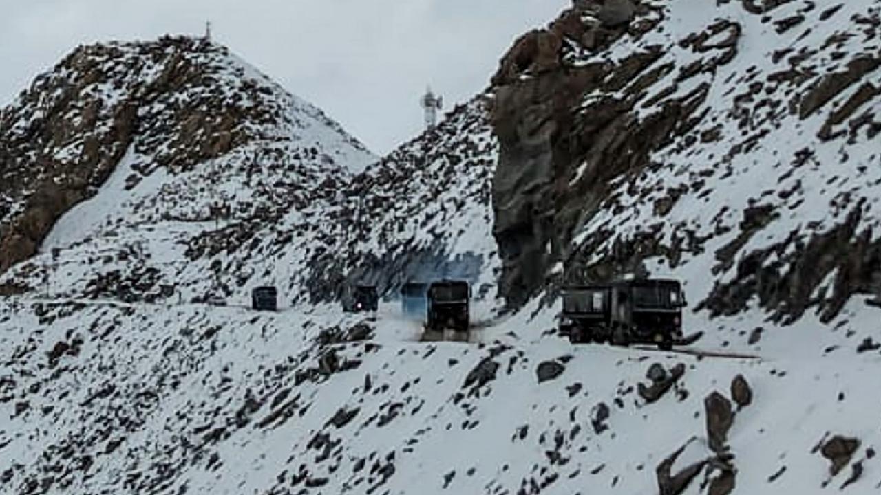 Indian Army vehicles drive on a road near the Chang La high mountain pass in northern India's Ladakh region of Jammu and Kashmir state near the border with China. Picture: AFP