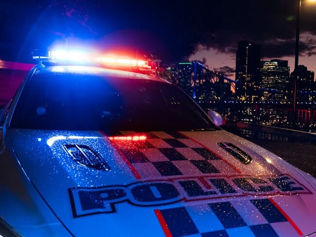 Generic picture of a Queensland Police car with lights flashing