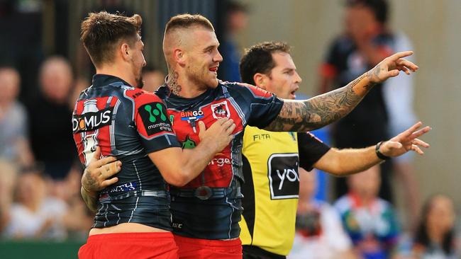 Josh Dugan celebrates a try for the Dragons. Picture: Mark Evans