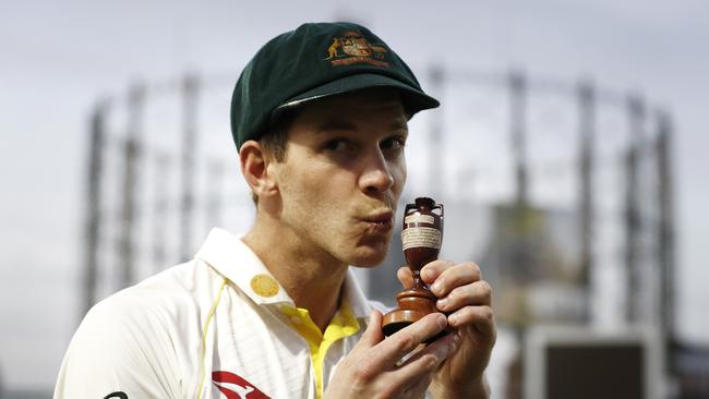 Tim Paine celebrates with the Urn after Australia drew the series with England to retain the Ashes last year. Picture: RYAN PIERSE/GETTY IMAGES