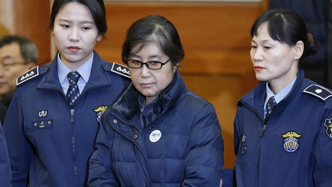 Choi Soon-sil, centre, gained so much influence with former President Park Geun-hye that she was dubbed the ‘Korean Rasputin’. Picture: AFP