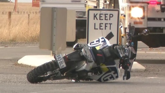 Police have charged a 55-year-old woman with driving offences after a collision with a 66-year-old motorbike rider, who remains in a serious condition in hospital. Picture: 7NEWS Adelaide