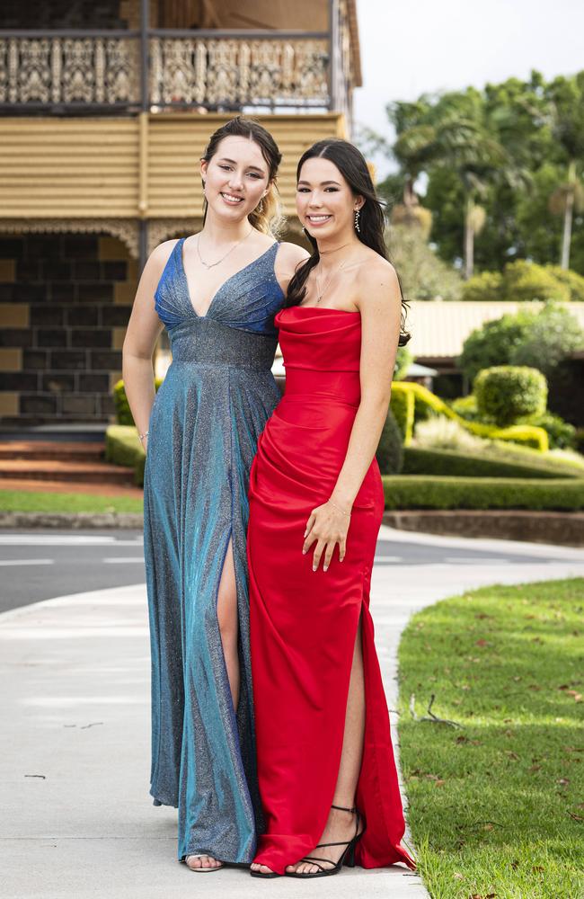 Graduates Charlotte Hanson (left) and Gemma Osmond as Downlands College year 12 students come together for their valedictory mass at the college, Saturday, November 16, 2024. Picture: Kevin Farmer