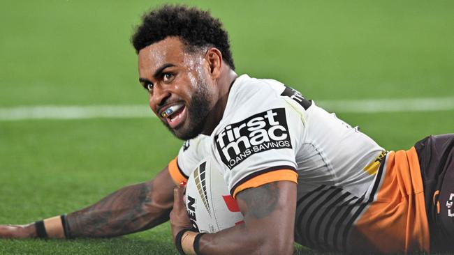 Ezra Mam of the Broncos scores a try during the 2023 NRL Grand Final match between Penrith Panthers and Brisbane Broncos at Accor Stadium in Sydney on October 1, 2023. (Photo by Izhar KHAN / AFP) / -- IMAGE RESTRICTED TO EDITORIAL USE - STRICTLY NO COMMERCIAL USE --