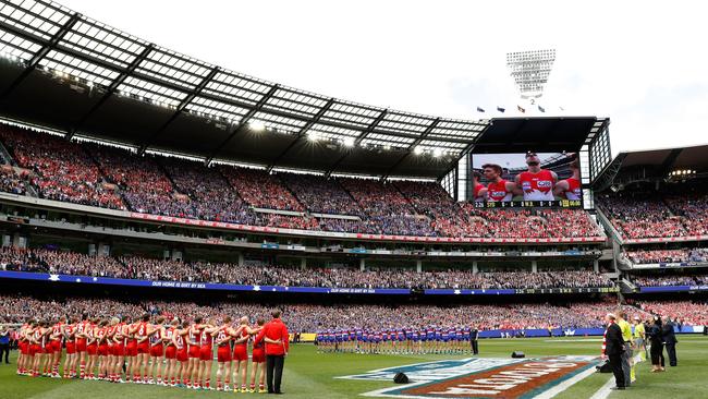 Swans and Bulldogs players line up for the national anthem ahead of the 2016 AFL Grand Final. Picture: Getty Images