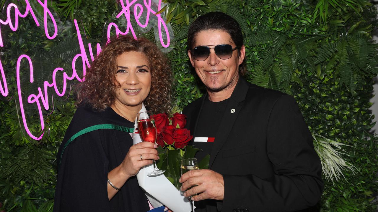 Anastasia Zikon and Leon Chris. Deakin School of Education; NIKERI; and Centre of Humanitarian Leadership students graduated on Wednesday lunchtime. Picture: Alan Barber