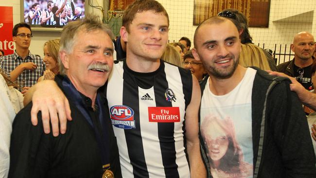 Heath Shaw (middle) celebrates with his father Ray (left) and brother Rhyce (right) after Collingwood’s 2010 premiership win. Heath was a father-son selection by Collingwood in 2003.