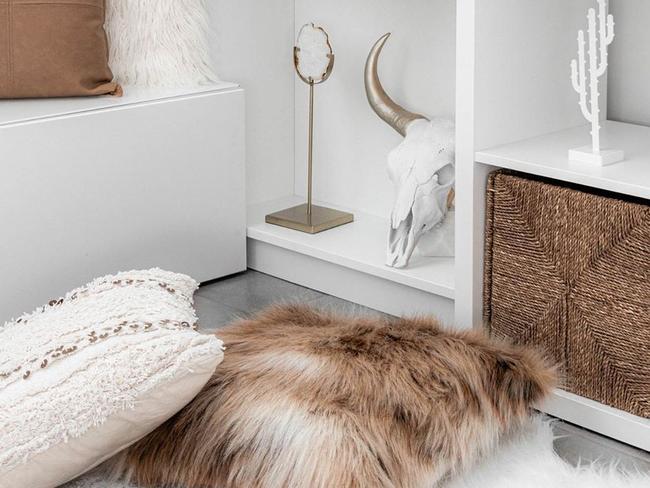 Ashlee uses baskets wherever she can to conceal her clutter.
