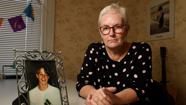 Jill Chapman with a photo of her son Michael (on his 15th birthday) who took his own life at 16yrs old. She is pictured at MOSH House. Picture: Tricia Watkinson