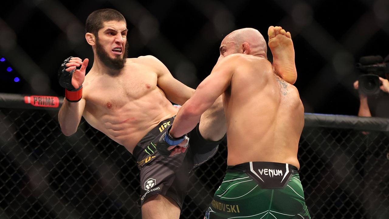 PERTH, AUSTRALIA - FEBRUARY 12: Islam Makhachev of Russia battles Alex Volkanovski of Australia in the UFC lightweight championship fight during UFC 284 at RAC Arena on February 12, 2023 in Perth, Australia. (Photo by Paul Kane/Getty Images)