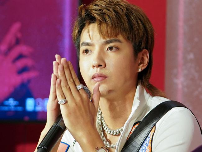 This photo taken on October 25, 2018 shows Chinese-Canadian ex-pop star Kris Wu, also known as Wu Yifan in Chinese, attending an event in Beijing. - Chinese-Canadian ex-pop star Kris Wu has been jailed for 13 years after being found guilty of rape, a Chinese court said on November 25, 2022, following a scandal that drew widespread condemnation. (Photo by CNS / AFP) / China OUT