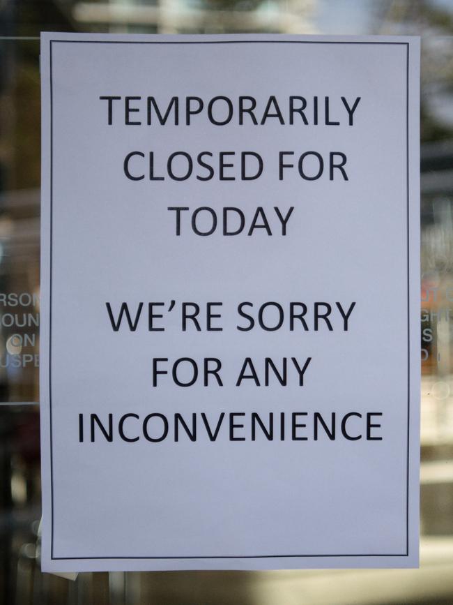 A sign in the window at The Pier Hotel in Glenelg on Monday. Photo Morgan Sette.