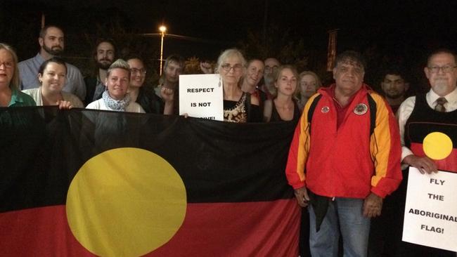 Protesters with the Aboriginal flag at the Campbelltown Council meeting. Picture: Daniela Abbracciavento