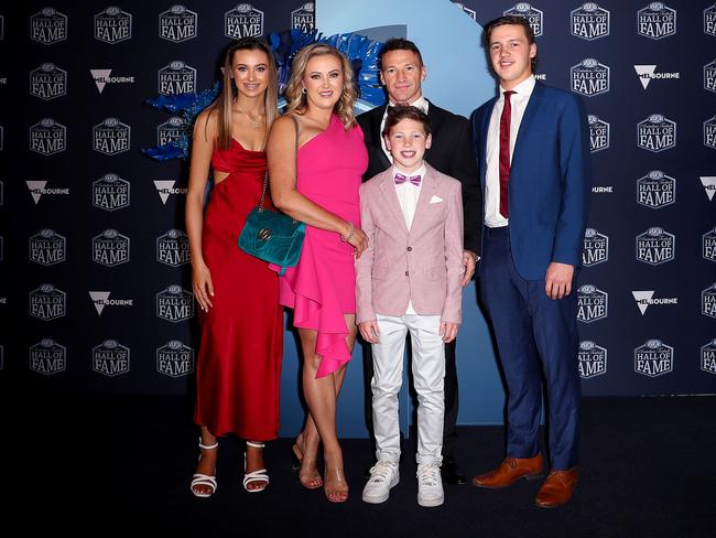 Harvey with his family at the ceremony. Picture: Getty Images