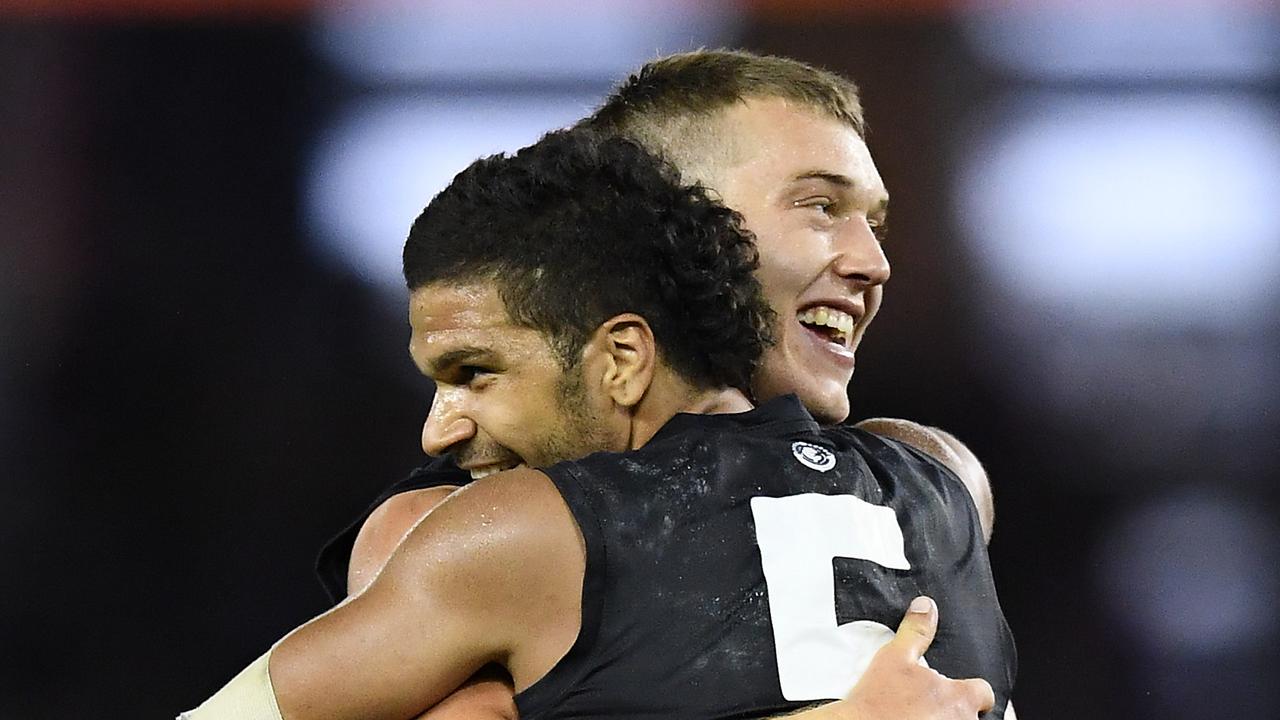 Patrick Cripps and Sam Petrevski-Seton celebrate Carlton’s victory over Western Bulldogs. Photo: Quinn Rooney/Getty Images.